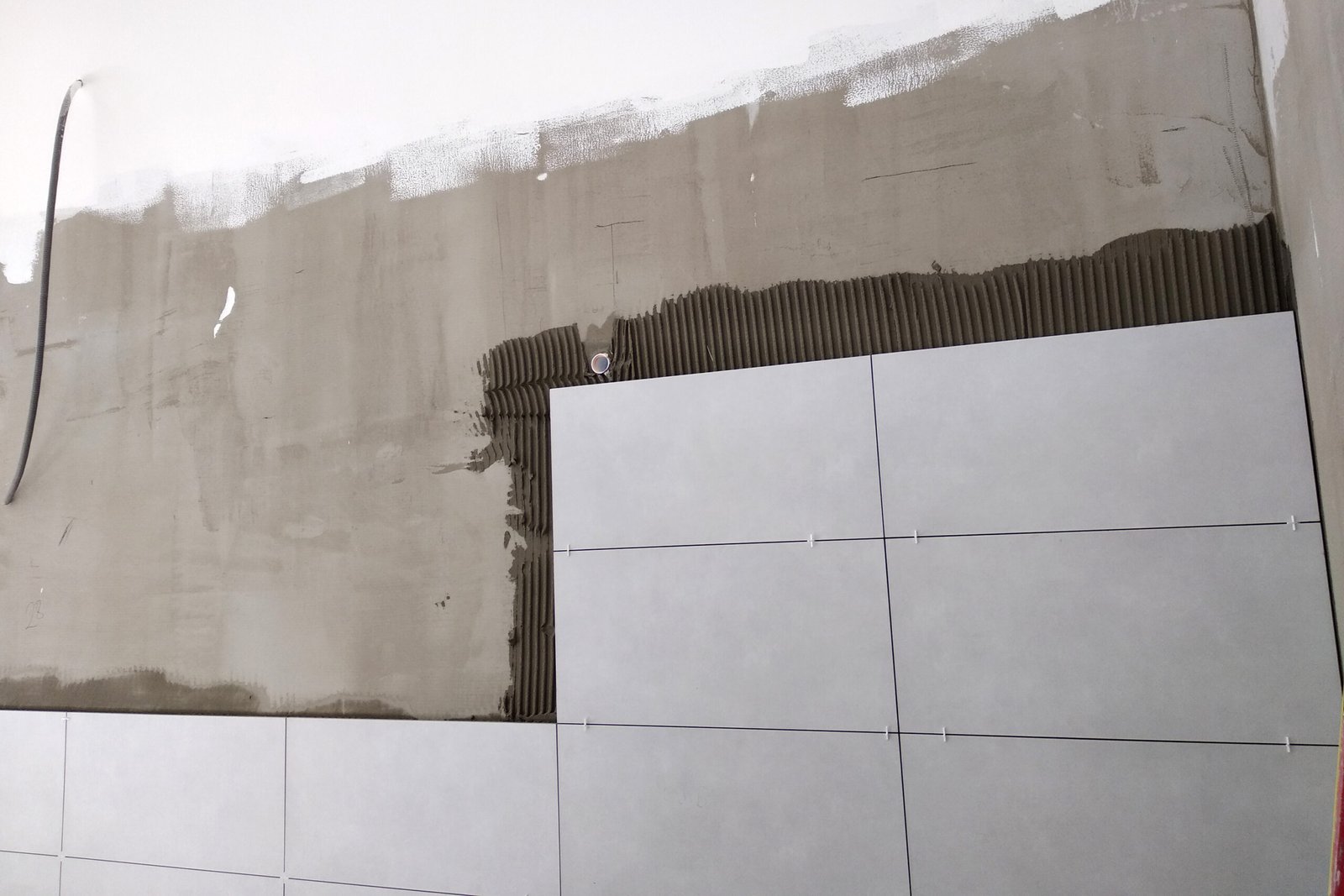 Wall ceramic tiles installation on mortar glue. Wall ceramic tiles installation on mortar glue.