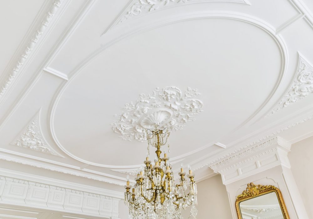 Beautiful patterned ceiling and elegant crystal chandelier